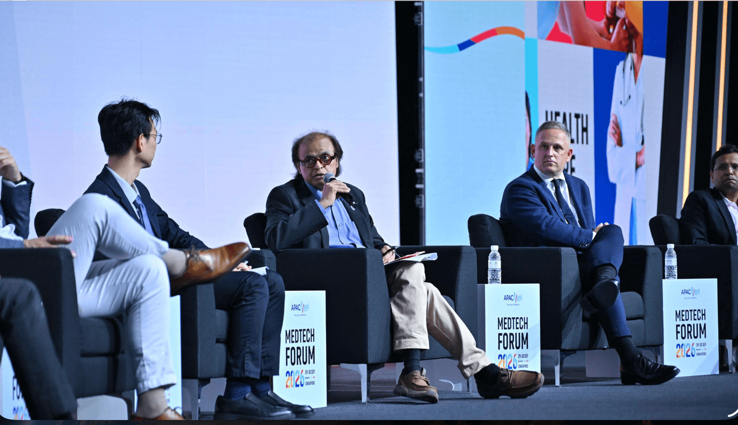 Dr. Rajendra Pratap Gupta speaking during the APACMed panel discussion